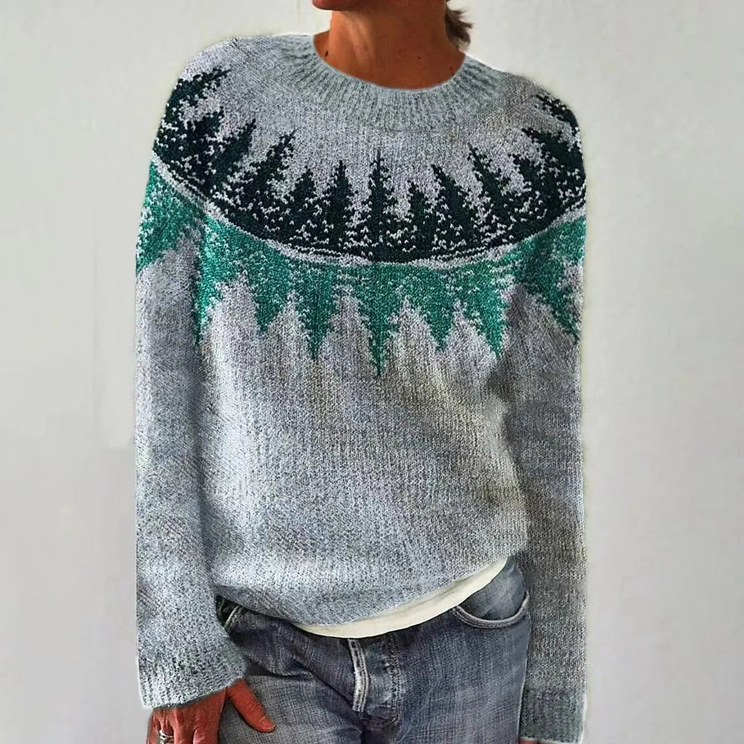 Farbenfroher Damen-Strickpullover im nordischen Retro-Stil, gemütliche Kleidung für kalte Wintertage.