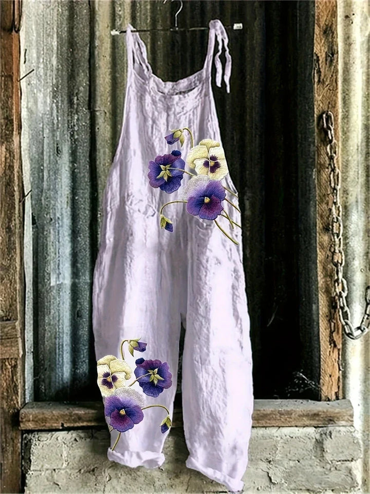 Sommerlicher Boho Damen Jumpsuit mit Blumendruck, ideal kombiniert für Urlaub & Stadt.