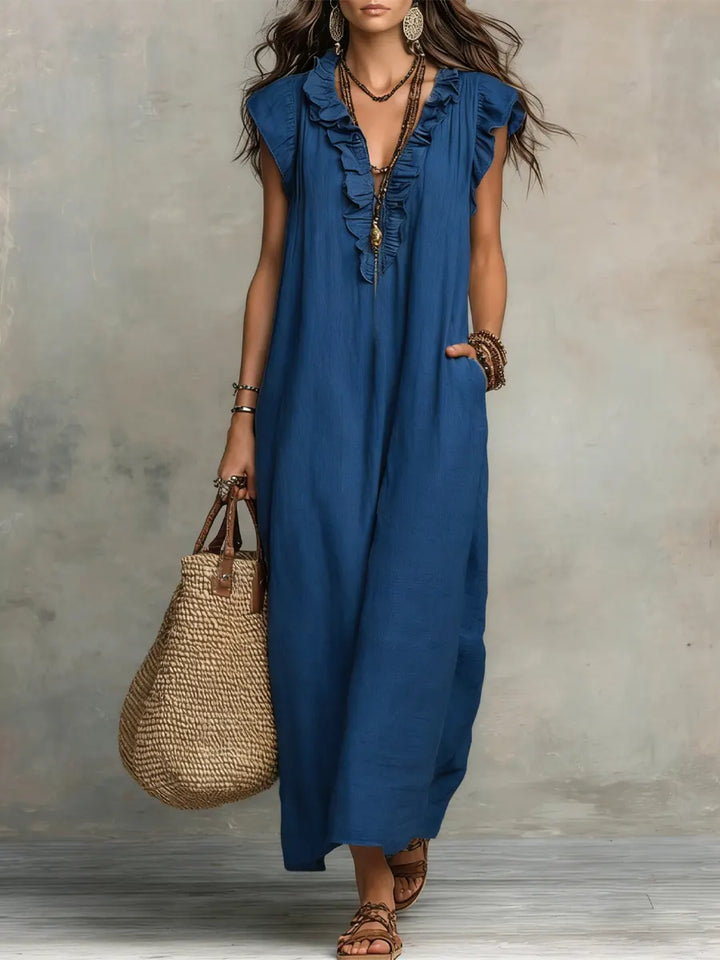 Fließendes Damen Sommer Maxikleid mit V-Ausschnitt. Langes, lockeres Freizeitkleid für warme Tage, elegant und komfortabel.