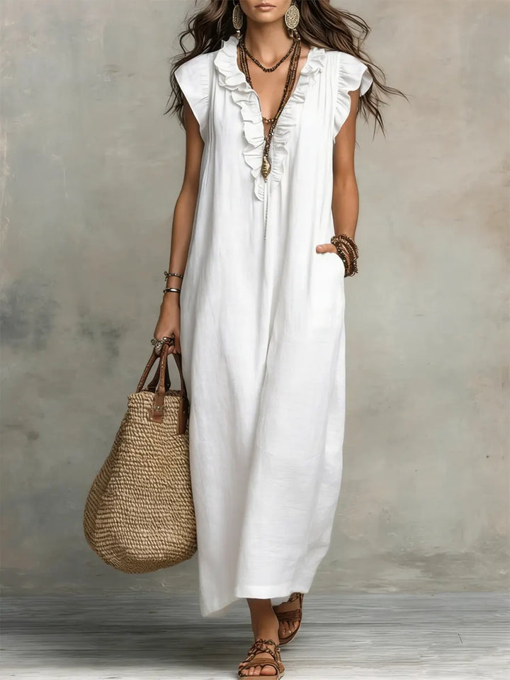 Lässiges Damen Maxikleid, V-Ausschnitt Freizeitkleid. Ärmelloses, langes Sommerkleid, elegant und fließend für jede Dame.