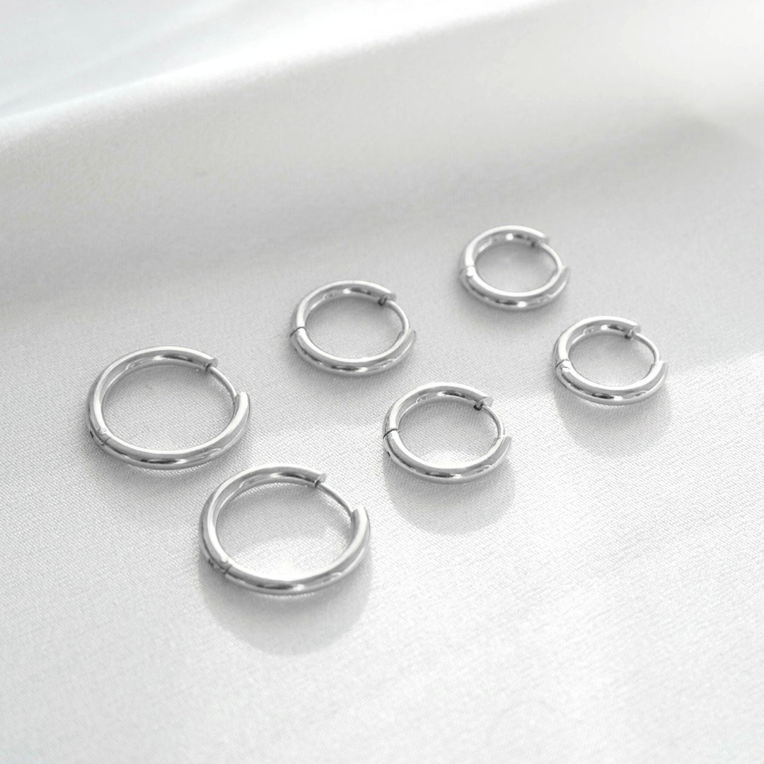 Elegantes Damen Schmuck Set mit Edelstahl Creolen in Gold & Silber, perfekt für einen stilvollen Auftritt.
