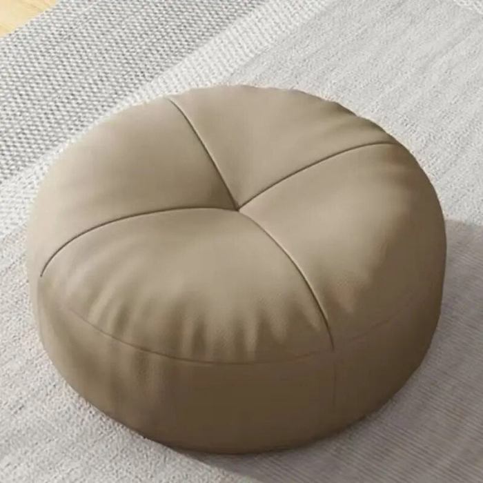 Rundes Bodenkissen in zeitlosem Grau, vielseitig als Sitz- oder Meditationskissen nutzbar.