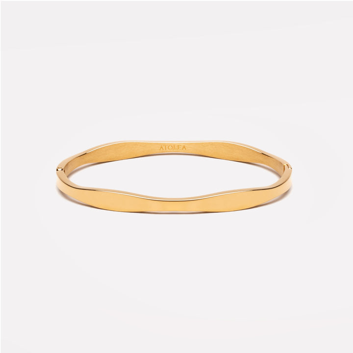 Filigraner Damen Goldarmreif in Wellenform, gefertigt aus robustem, wasserdichtem Edelstahl. Modernes Design.