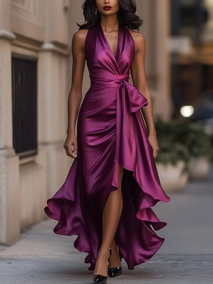 Fließendes Damen Wickelkleid in Bewegung. Ideales Partykleid für Hochzeitsgäste und besondere Anlässe.
