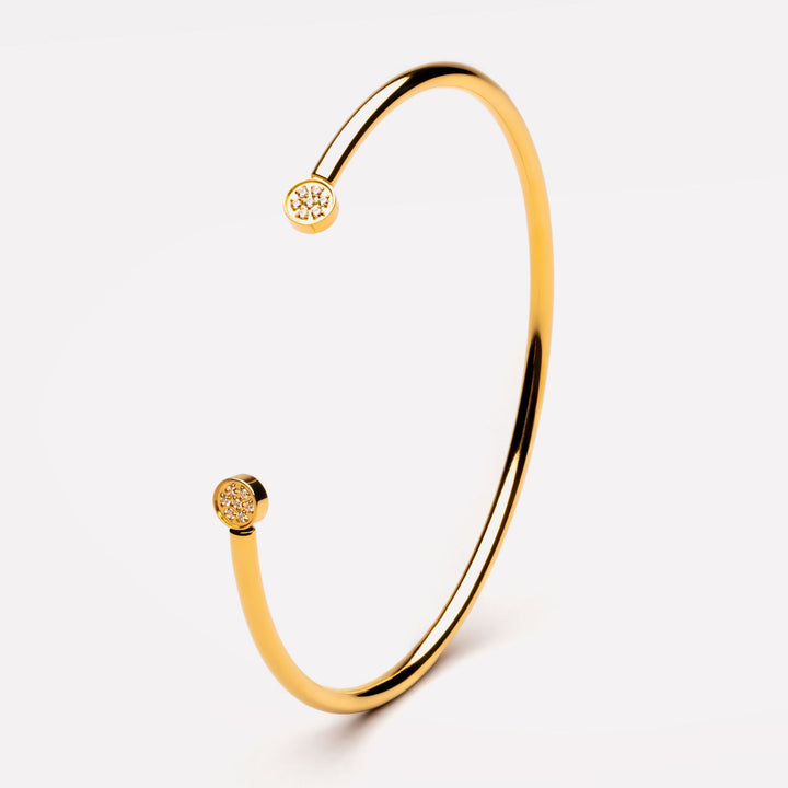 Eleganter Damen Goldarmreif aus Edelstahl mit glitzernden Zirkonsteinen, verstellbar und wasserfest.