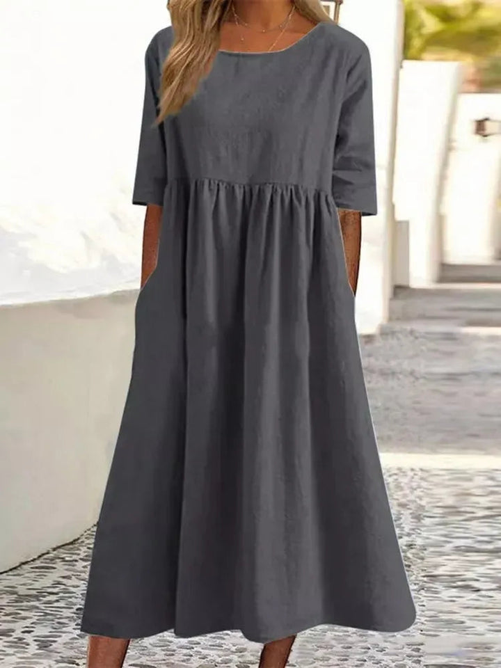 Damenmode: Bequemes Kurzarm Rundhals Kleid mit praktischen Taschen für Frühling & Sommer.