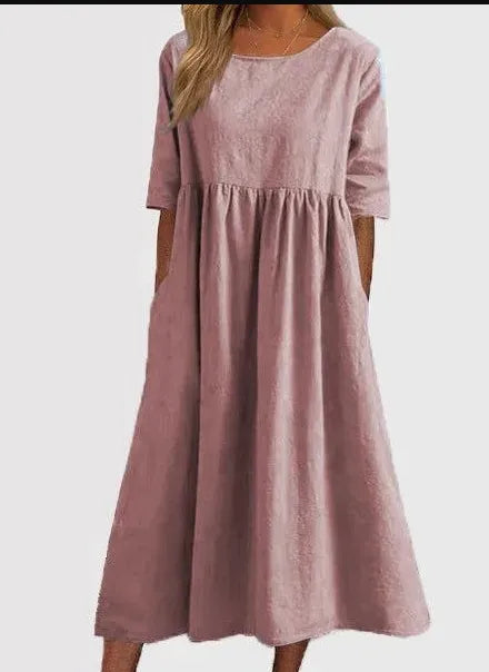 Komfortables Damen Freizeitkleid mit Rundhals, Kurzarm und Taschen, locker & vielseitig.