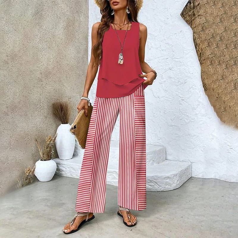 Stylishes Damen Sommeroutfit: Zweiteiler mit trendigem Blattdruck, ärmellos und bequeme weite Hose.