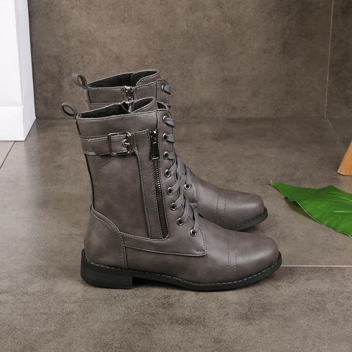 Elegante Damen-Winterstiefel mit seitlichem Reißverschluss, modisch und orthopädisch, für bequemes Gehen.