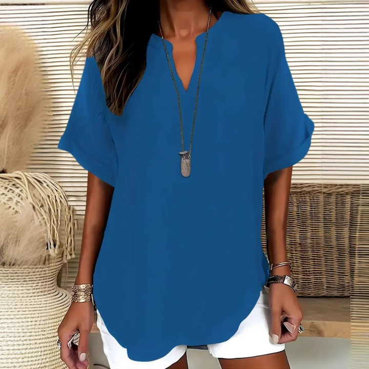 Elegante Damen Sommerbluse mit V-Ausschnitt. Ideal für Freizeit, Urlaub und Alltagsmode.