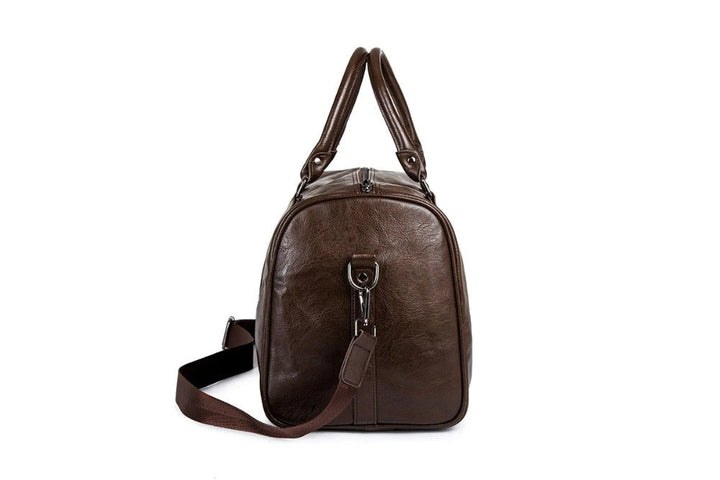 Stilvolle schwarze Leder-Handgepäcktasche, robust und langlebig, ideal für Business- und Freizeitreisen.