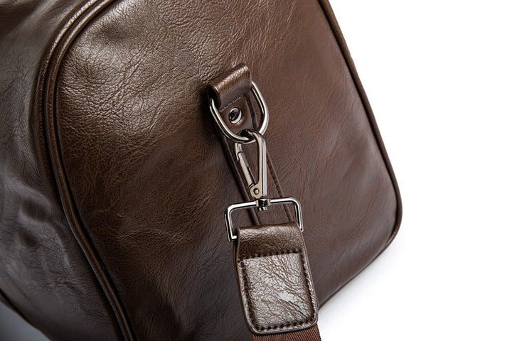 Brauner Leder Weekender, groß, unisex, elegantes Design, robustes Gepäck für kurze Reisen.
