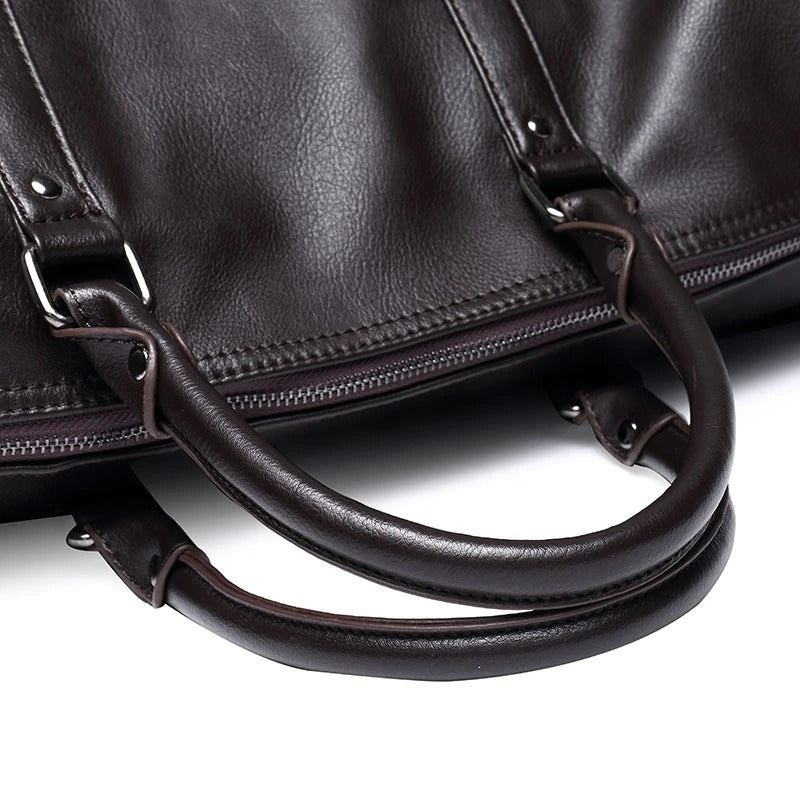 Braune Leder Handgepäck Reisetasche, robust, unisex, stilvoll und mit großem Fassungsvermögen.