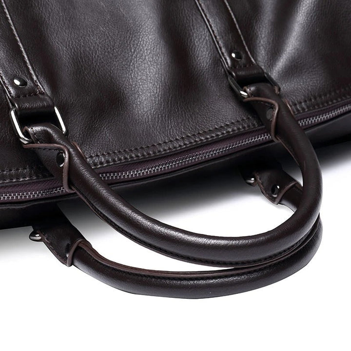 Braune Leder Handgepäck Reisetasche, robust, unisex, stilvoll und mit großem Fassungsvermögen.