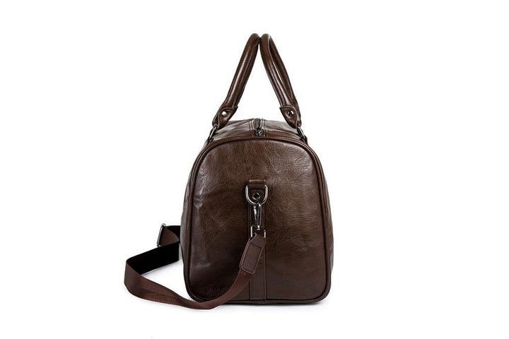 Elegante braune Leder-Reisetasche, unisex, großzügig dimensioniert, für stilvolles Reisen.