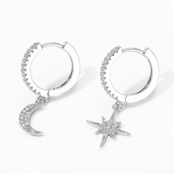 Glitzernde Mond & Stern Hängeohrringe für Damen, besetzt mit Zirkonen. Hypoallergener Schmuck, ideal für jeden Tag.