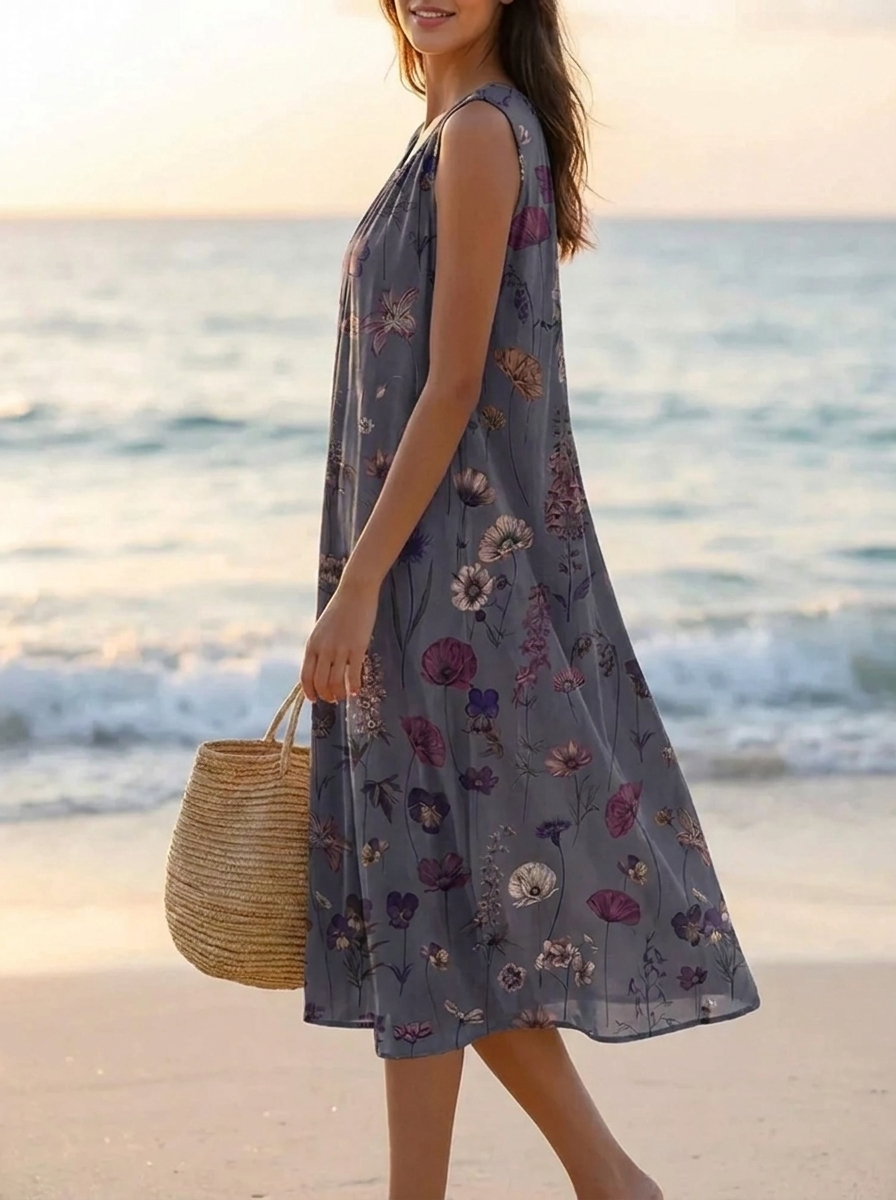 Ärmelloses Damen-Blütenkleid im Vintage-Stil. Ein elegantes Midikleid, ideal für Urlaub & Sommerpartys.