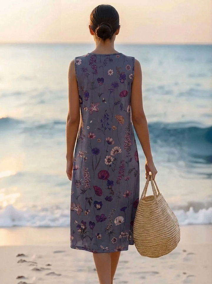 Damen Midikleid mit wunderschönem Blütenmuster. Elegantes Sommerkleid im zeitlosen Stil für jede Frau.