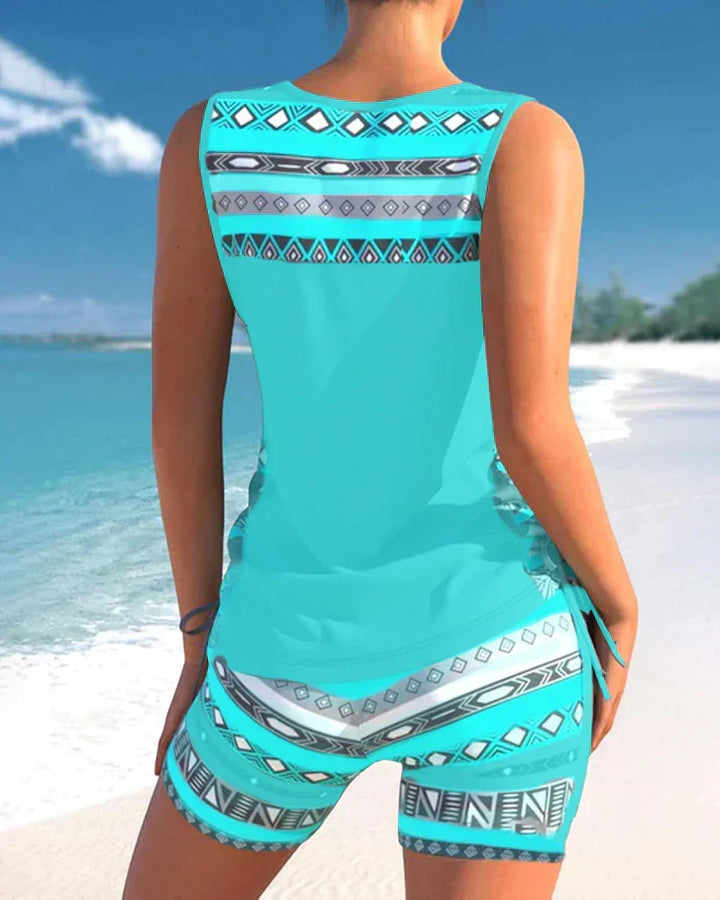 Attraktives Damen Tankini Set mit geometrischem Muster und V-Ausschnitt für Pool und Strand.