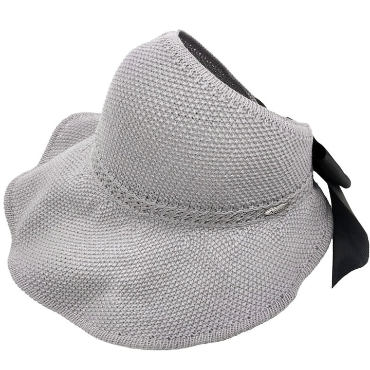 Trendiger Sommerhut für Damen, Stroh, mit UV-Schutz und Pferdeschwanzöffnung. Ideal für den Strand.