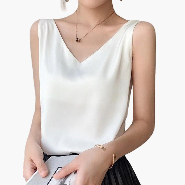 Damen Sommer Top mit V-Ausschnitt, elegant & luftig, ideal für warme Tage, weicher Stoff, vielseitig kombinierbar.