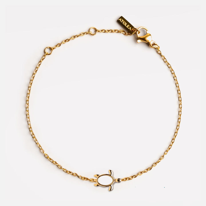 Golden Damen Schildkröten Armband aus Edelstahl mit Perlmutt, maritim & elegant. Robust und wasserdicht.