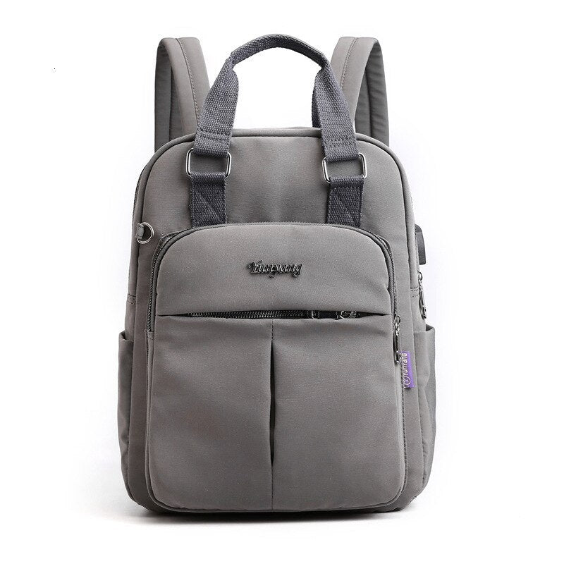 Eleganter Anti-Diebstahl-Rucksack für den täglichen Gebrauch, mit USB und Fächern.