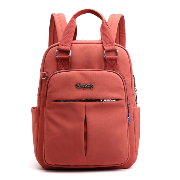 Sicherer Schulrucksack mit USB-Ladefunktion, schützt Wertsachen und Elektronik.