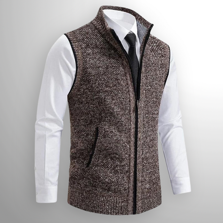 Dunkelblaue Herren Strickweste mit Stehkragen. Ärmellose Weste mit Reißverschluss für elegante Looks.