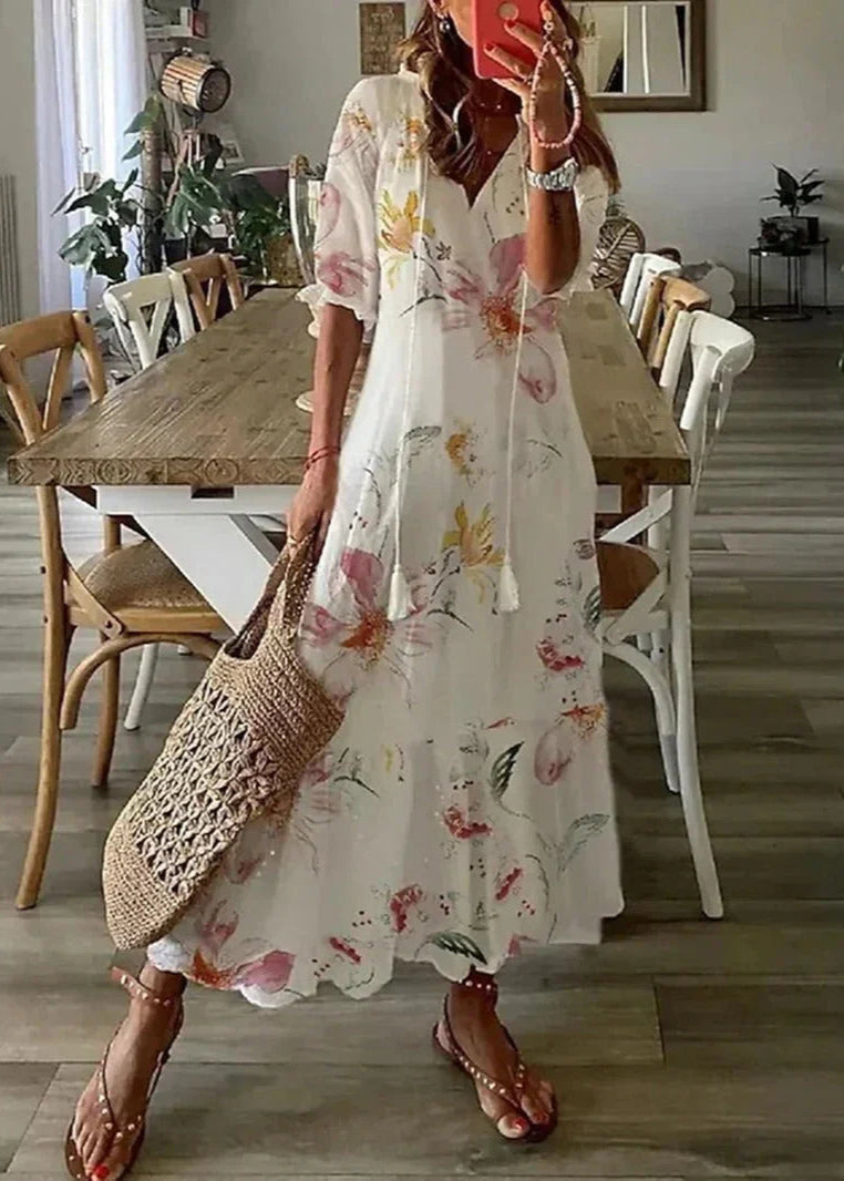 Vielseitiges Damen Maxikleid, sommerliches Blumenmuster & Kordelzug-Taille. Ideal für Urlaub & Alltag.