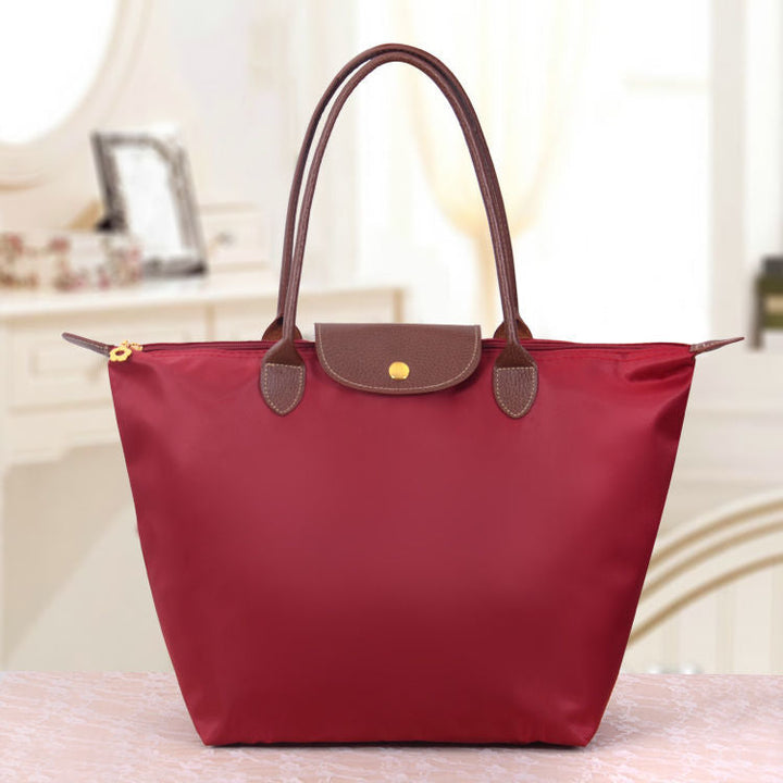 Große, vielseitige Damen Handtasche aus Canvas mit edlen Lederapplikationen für jeden Tag.
