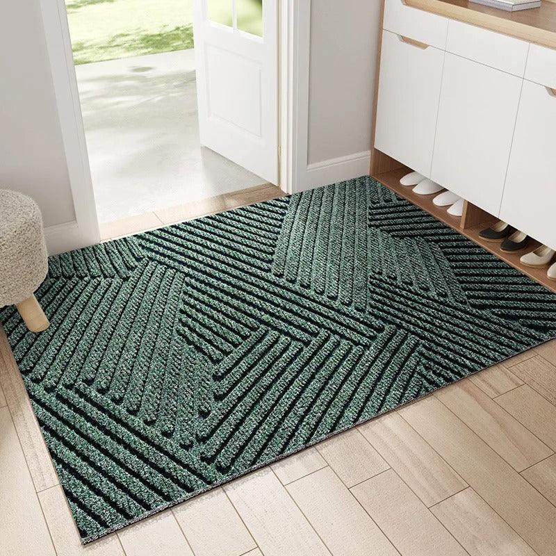Zuschneidbarer Eingangsteppich in Kaki, als Antirutschmatte für Bodenschutz im Flur; modern & robust.