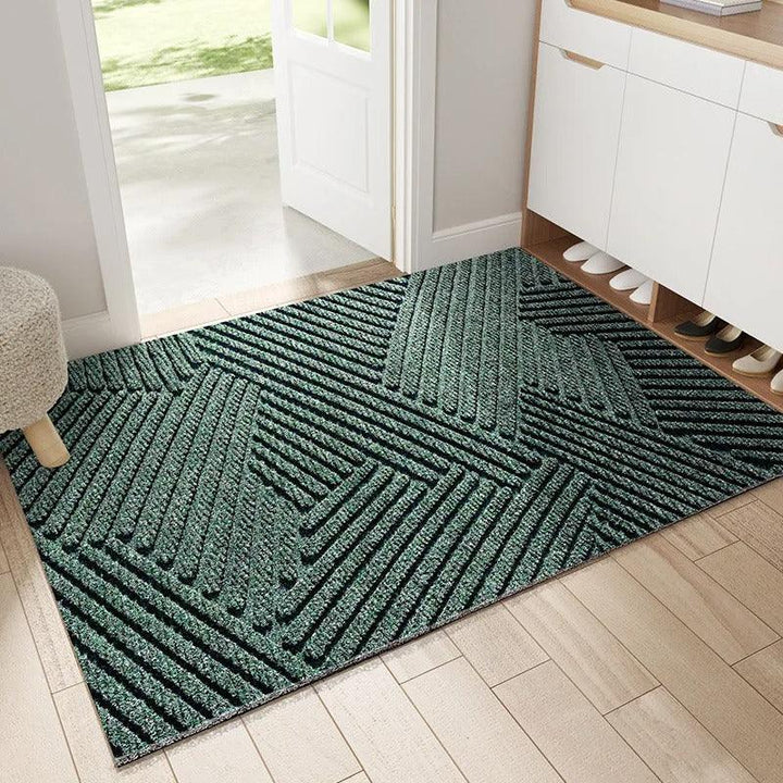 Zuschneidbarer Eingangsteppich in Kaki, als Antirutschmatte für Bodenschutz im Flur; modern & robust.