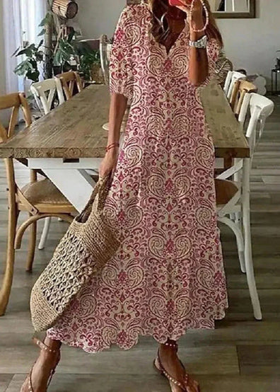 Lila Sommer Maxikleid für Damen, floral gemustert mit verstellbarer Kordelzug-Taille. Bequem & stilvoll.