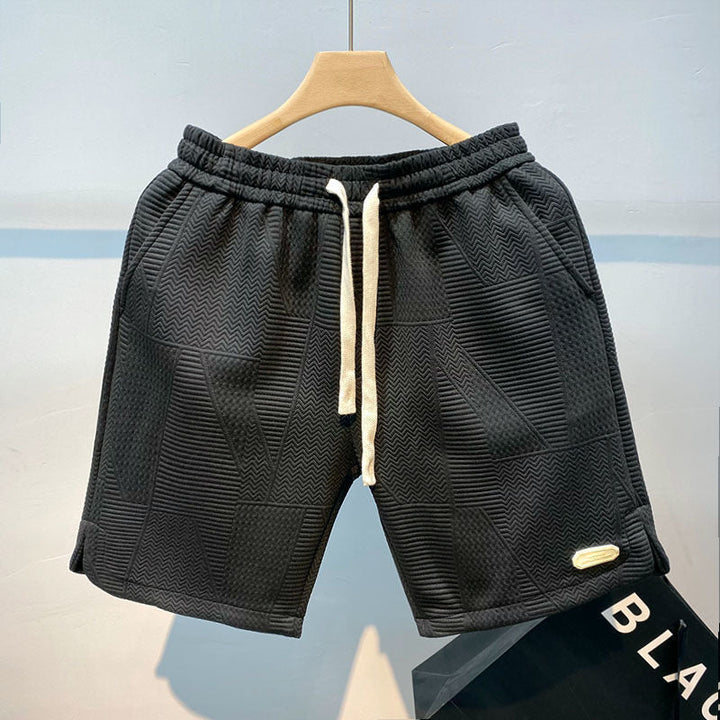 Nahaufnahme bequemer Herren Casual Shorts, ideal für Sommer. Weicher Stoff, praktische Seitentaschen. Stilvolle kurze Hose.