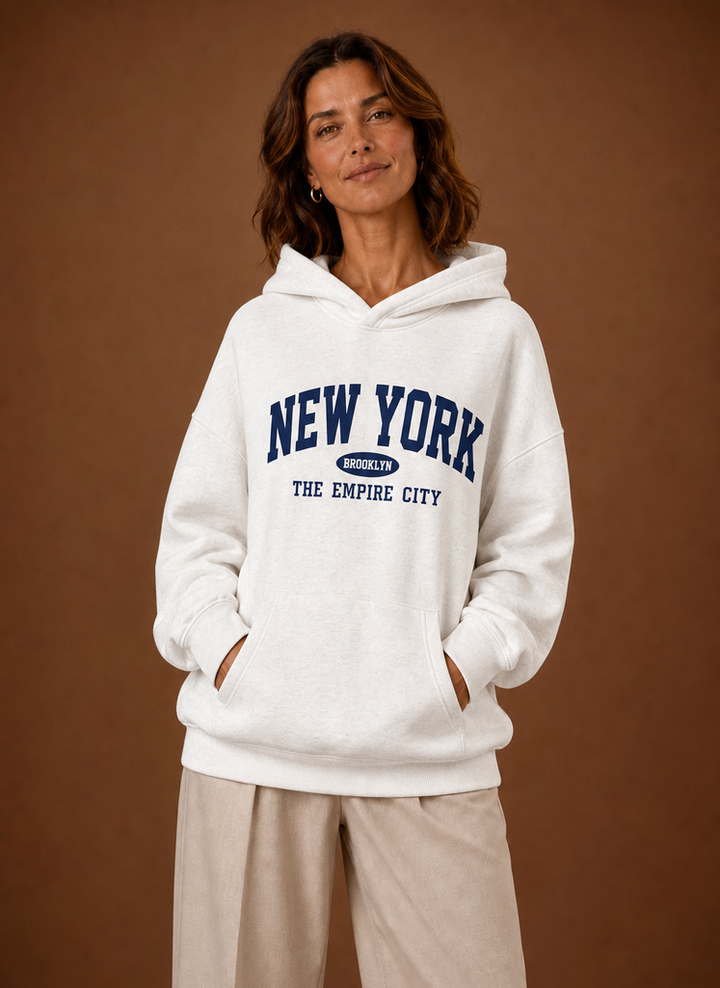 Damen Oversized Kapuzenpullover mit trendigem Print, ideal für Freizeit & Herbstmode.
