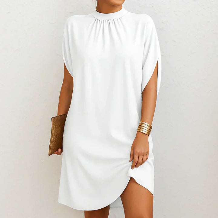 Fließendes Damen Cocktailkleid mit Hochkragen für Partys & Sommerabende. Schickes, lockeres Midikleid.