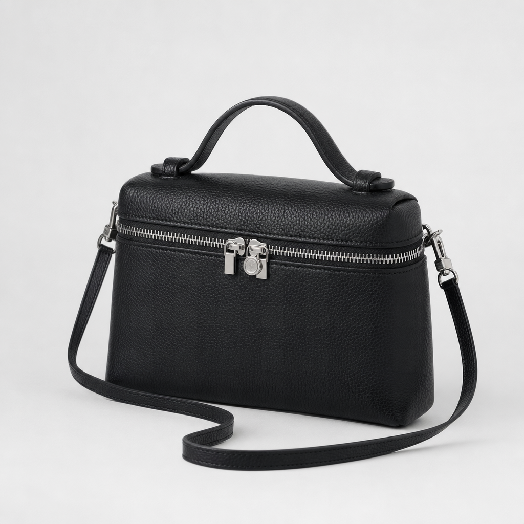 Detailansicht der eleganten Damen Box-Tasche mit stabilem Griff und verstellbarem Crossbody-Gurt.