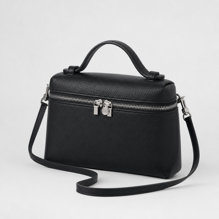 Detailansicht der eleganten Damen Box-Tasche mit stabilem Griff und verstellbarem Crossbody-Gurt.