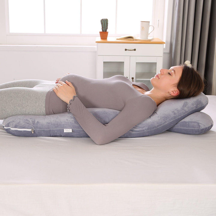 Ergonomisches Schwangerschaftskissen aus Baumwolle für Seitenschläfer, lindert Beschwerden in der Mutterschaft.