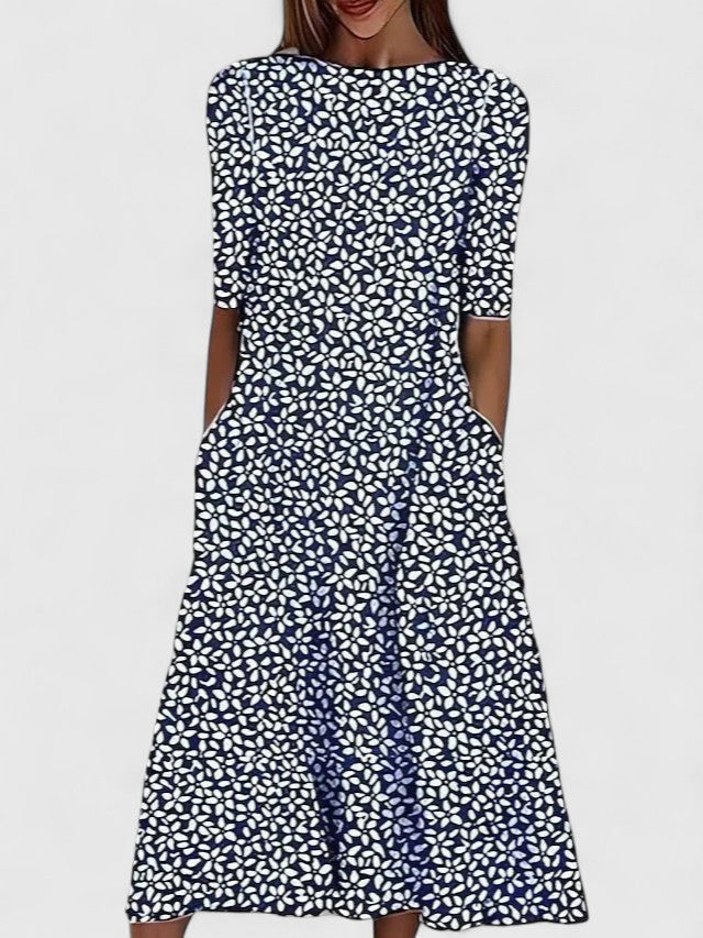 Stilvolles Damen Freizeitkleid, knielang, mit elegantem Blumenmuster. Perfektes, bequemes Urlaubs-Sommerkleid.